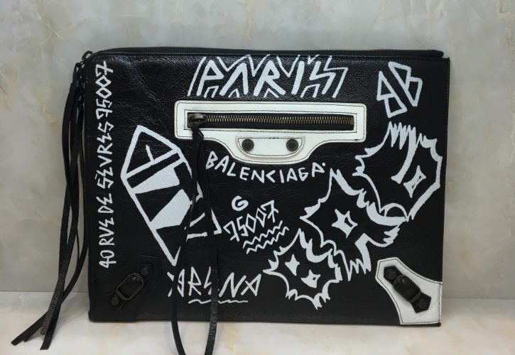Balenciaga Graffiti Bazaar Leather Clutch Redefines Urban Chic at Paris Fashion Week