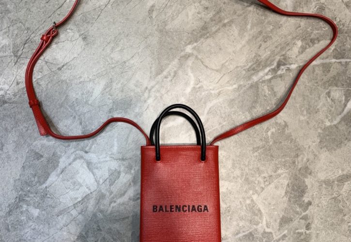 Balenciagas Red Phone Pouch Tote Redefines Luxury Fashion Accessory