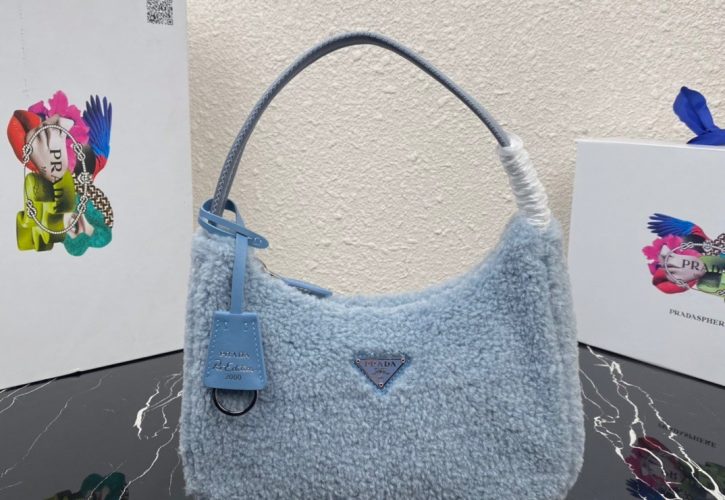 Pradas New Hobo Fur Bag Redefines Luxury Fashion at the Paris Fashion Week